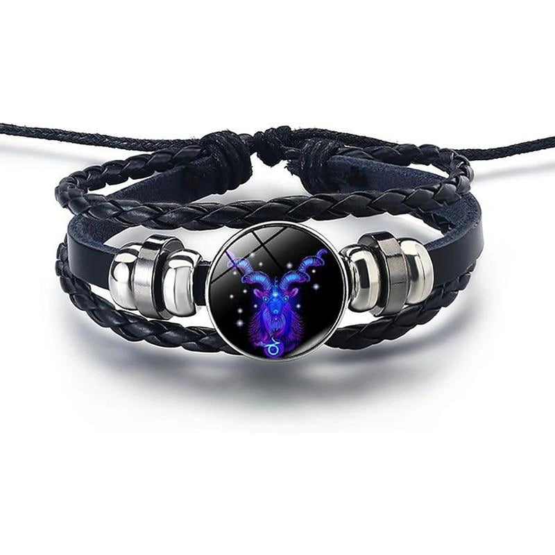 Bracelet with black braided strap and silver accents featuring a purple and blue design on a white background
