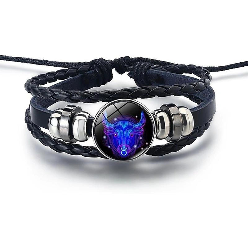 Bracelet with black braided strap and silver accents featuring a blue and purple emblem on a white background