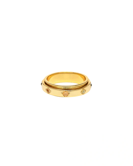 Gold ring with small stones on a white background