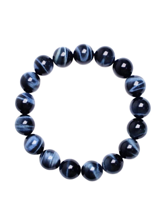 Blue beaded bracelet on a white background