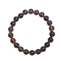 Brown beaded bracelet on a white background