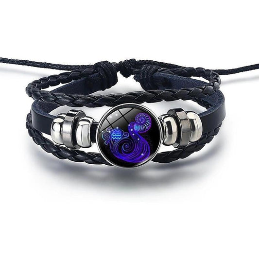 Black braided leather bracelet with silver accents and a purple and blue circular pendant on a white background