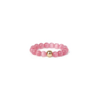 Pink beaded ring with a gold accent on a white background