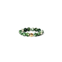 Green beaded ring with a gold accent on a white background