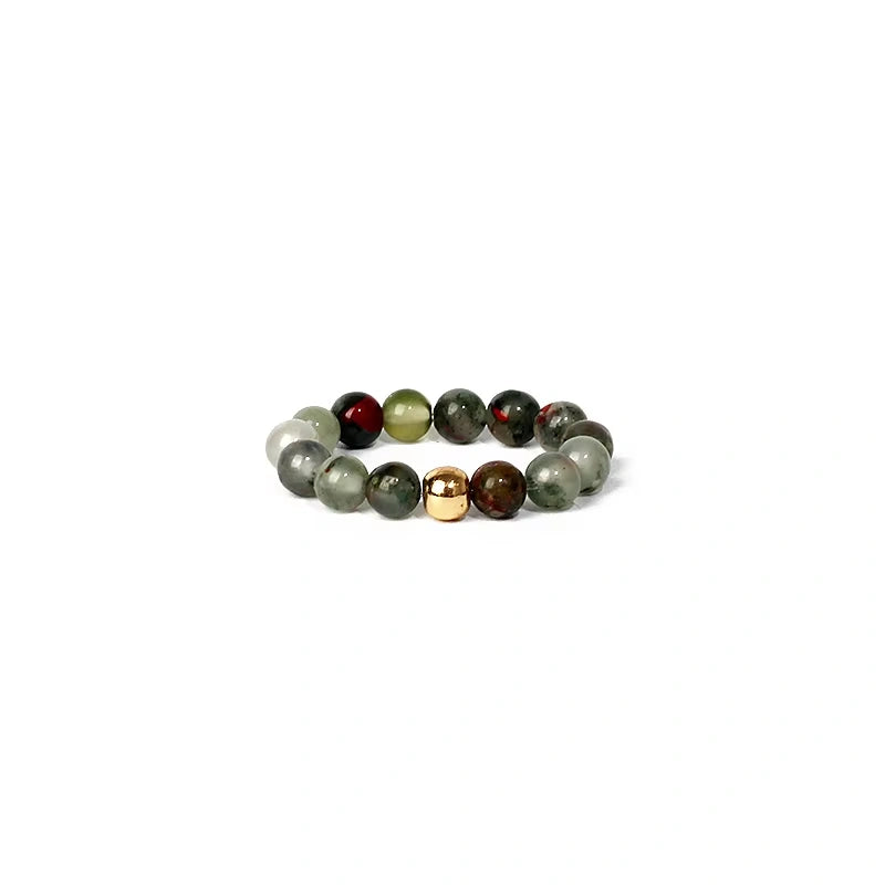 Multicolored beaded ring on a white background